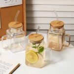 Glass cup with straw