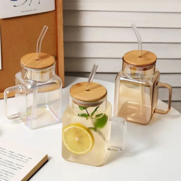 Glass cup with straw