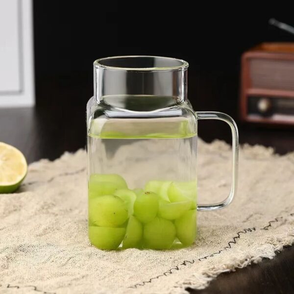 Glass cup with straw