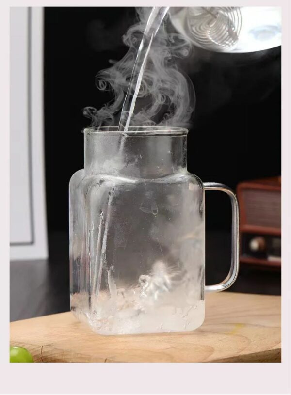 Glass cup with straw