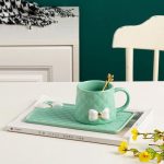 Elegant Pink Ceramic Mug and Saucer Set with Bow