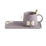 Elegant Pink Ceramic Mug and Saucer Set with Bow