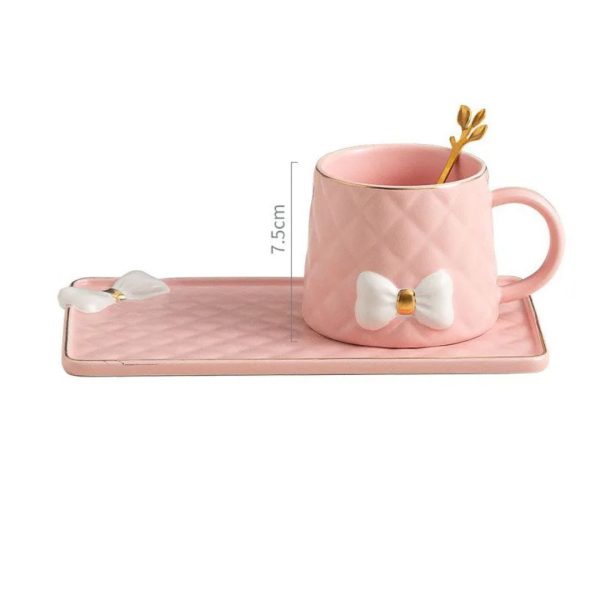 Elegant Pink Ceramic Mug and Saucer Set with Bow