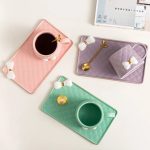 Elegant Pink Ceramic Mug and Saucer Set with Bow