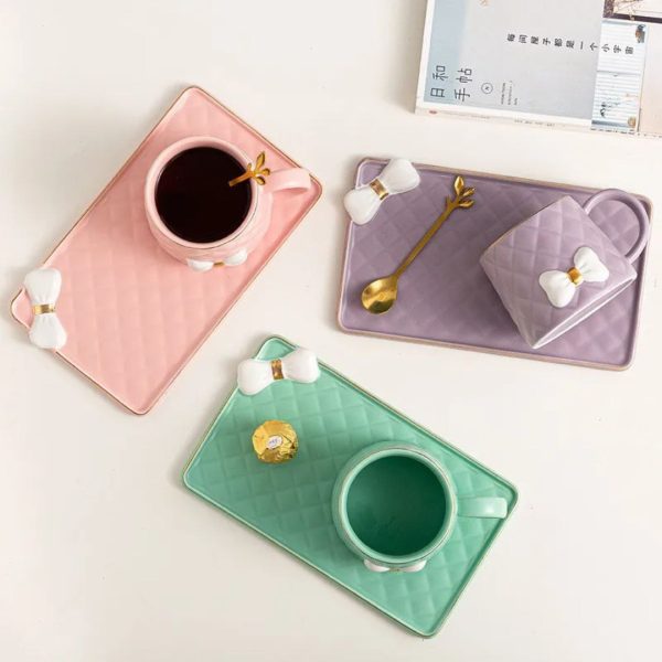 Elegant Pink Ceramic Mug and Saucer Set with Bow